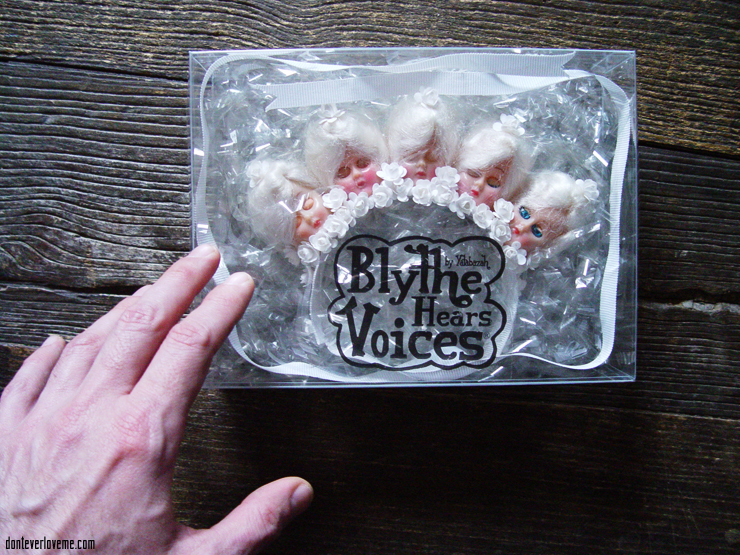 This piece is in all white, with 1940s doll heads and flowers.